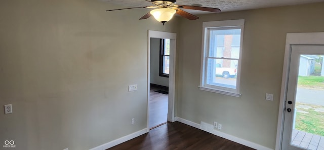 interior space featuring dark hardwood / wood-style floors and ceiling fan