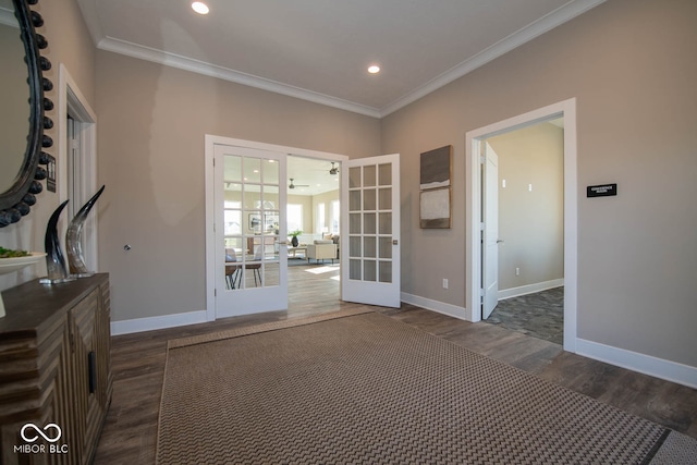 interior space featuring french doors, crown molding, and dark hardwood / wood-style floors