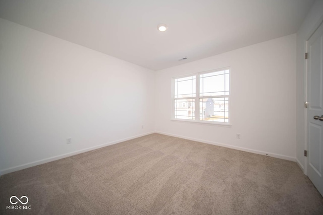 unfurnished room featuring carpet floors