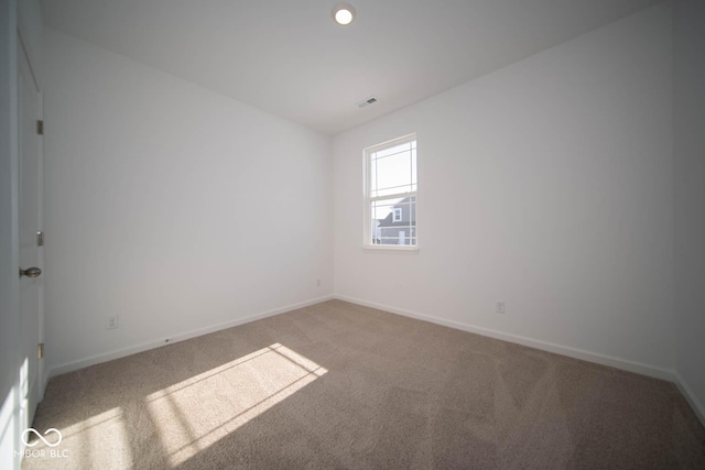 view of carpeted spare room