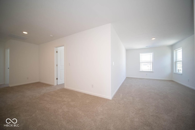 view of carpeted spare room