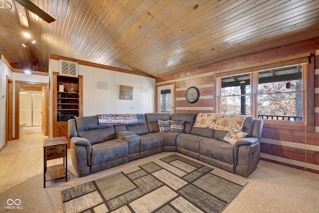 9300 Derrett Rd, Unionville, IN 47468 - carpeted living room with wood ceiling and wood walls