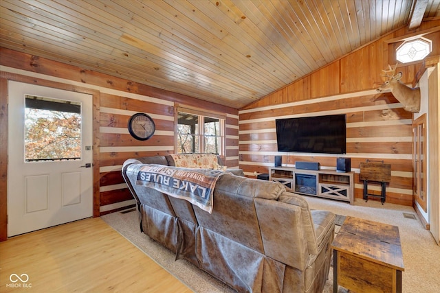 9300 Derrett Rd, Unionville, IN 47468 - living area with wood walls, vaulted ceiling, wooden ceiling, and wood finished floors