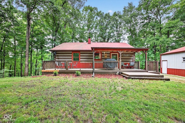 9300 Derrett Rd, Unionville, IN 47468 - back of property with a chimney, a yard, a metal roof, and a wooden deck