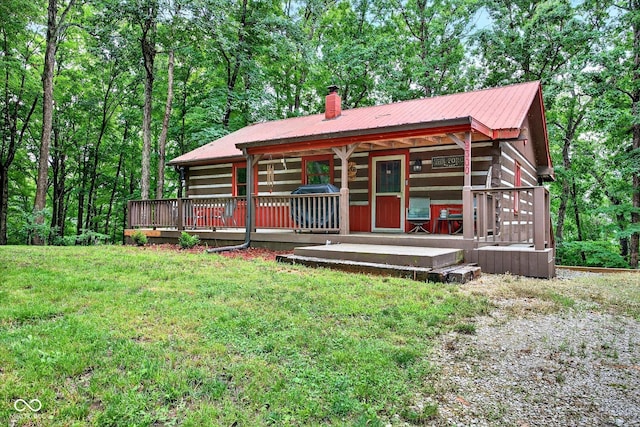 9300 Derrett Rd, Unionville, IN 47468 - rear view of property with a chimney, a yard, and a metal roof