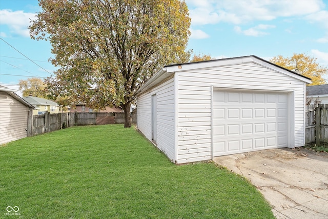 garage with a yard