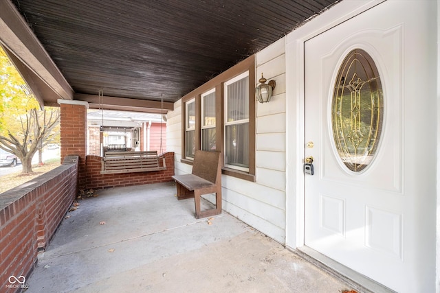 entrance to property with covered porch