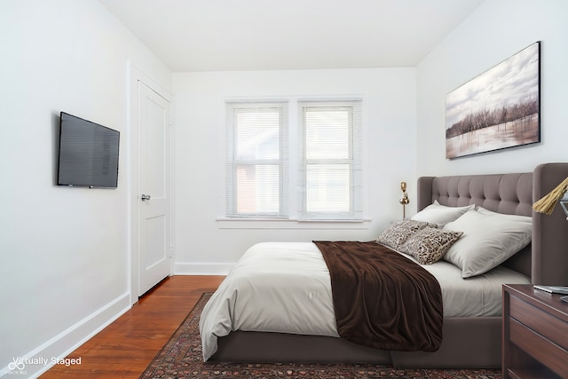 bedroom featuring wood-type flooring