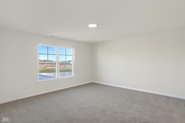 view of carpeted spare room