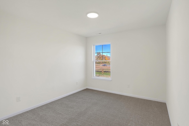 empty room featuring carpet flooring