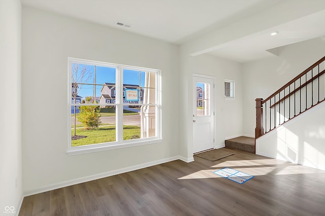 entrance foyer featuring hardwood / wood-style floors