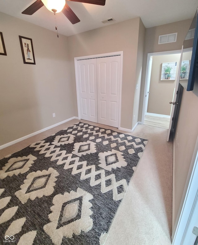 bedroom featuring a closet and ceiling fan