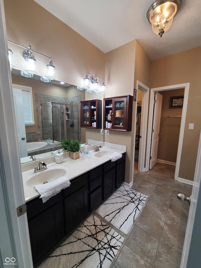 bathroom with plus walk in shower and vanity