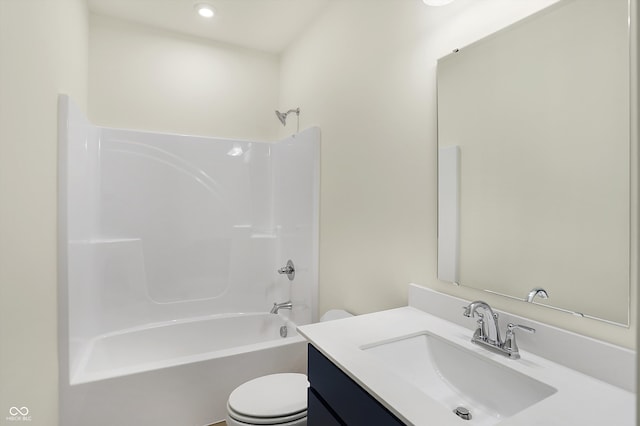 full bathroom featuring vanity, toilet, and bathtub / shower combination