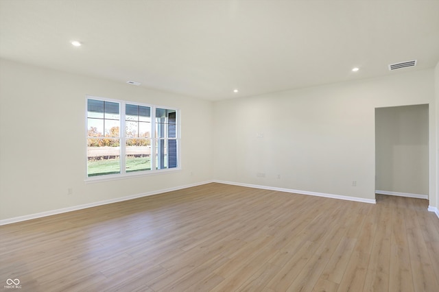 empty room with light wood-type flooring