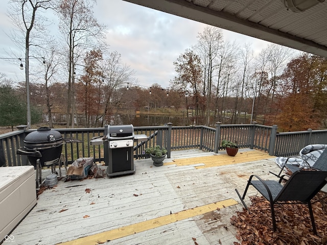 wooden deck with area for grilling