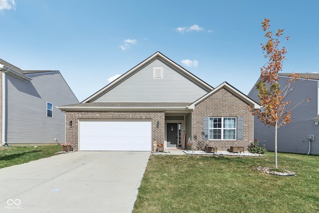 view of front of house featuring a front yard and a garage