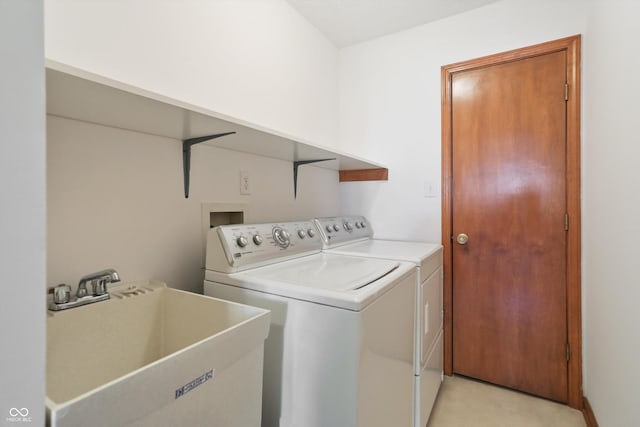 laundry room with washing machine and dryer