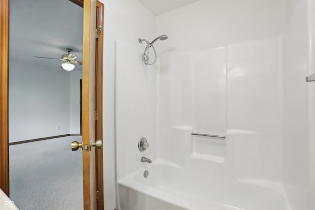 bathroom with tub / shower combination and ceiling fan
