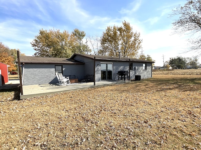 rear view of property with a patio