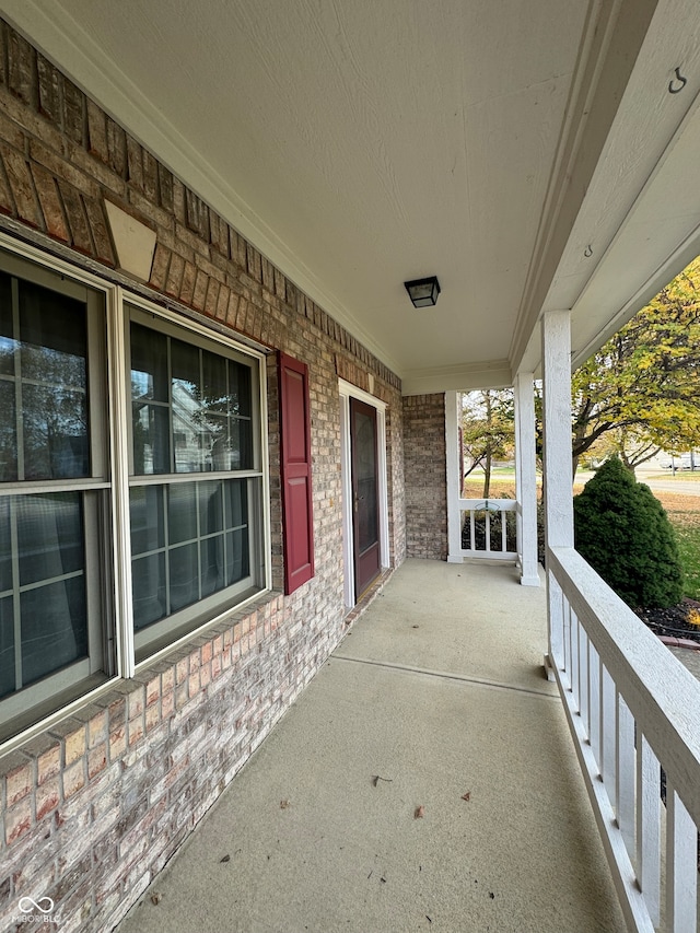 view of patio featuring a porch