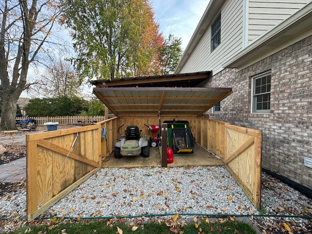 exterior space featuring a carport