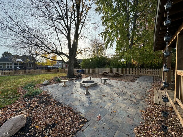 view of patio / terrace featuring an outdoor fire pit