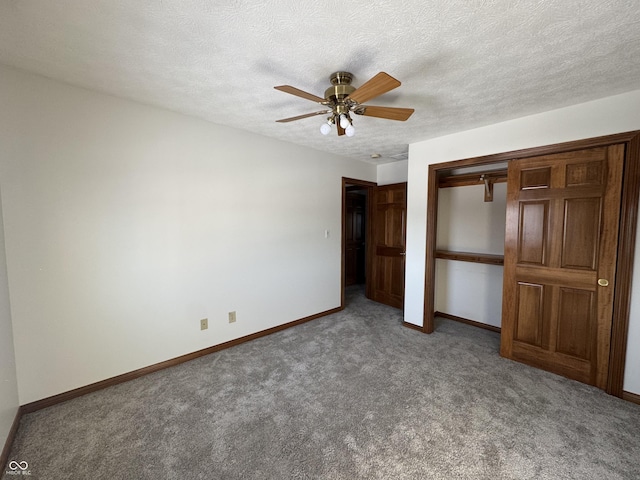 unfurnished bedroom featuring ceiling fan, carpet flooring, a textured ceiling, and a closet