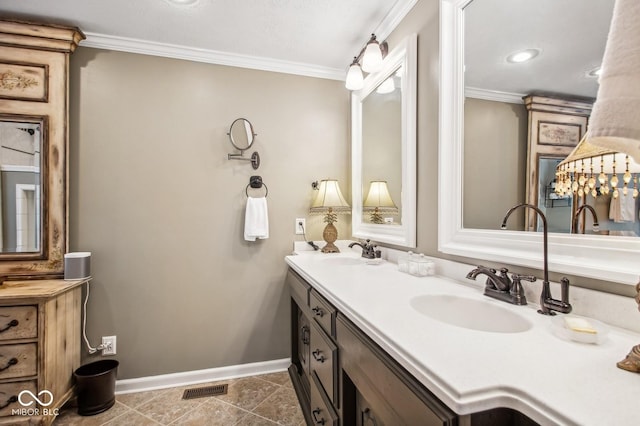 bathroom with tile patterned flooring, vanity, and crown molding