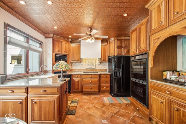 kitchen with black appliances, sink, ceiling fan, ornamental molding, and light tile patterned flooring