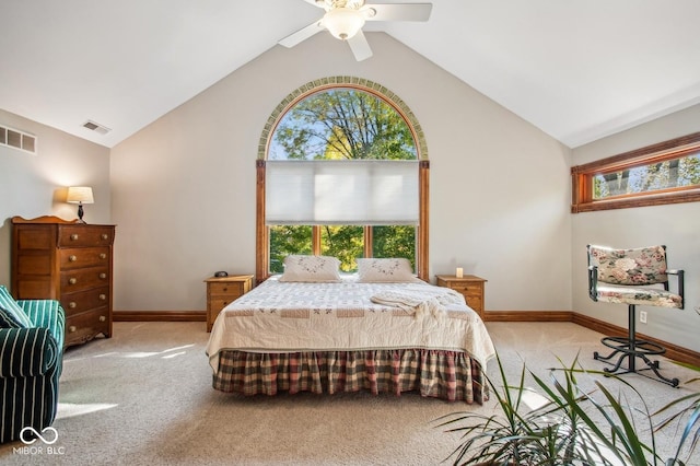 carpeted bedroom featuring vaulted ceiling, multiple windows, and ceiling fan