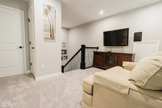 living room featuring light carpet