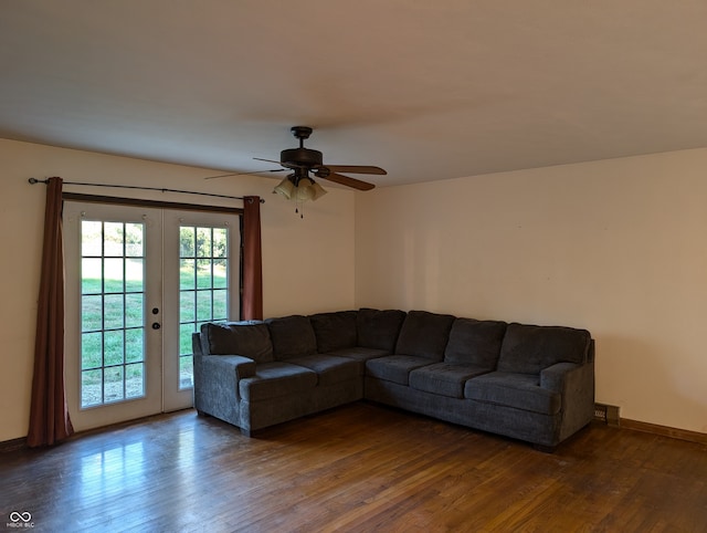 living room featuring french doors, dark hardwood / wood-style floors, and ceiling fan