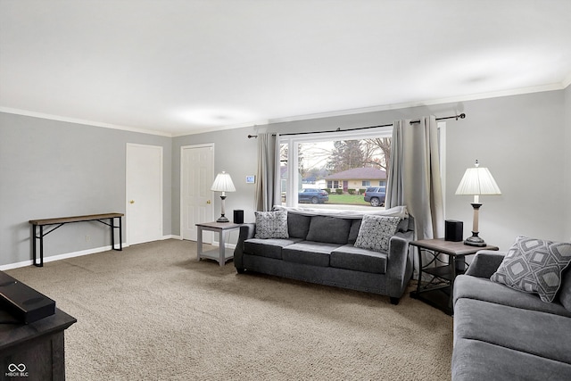 carpeted living room with ornamental molding