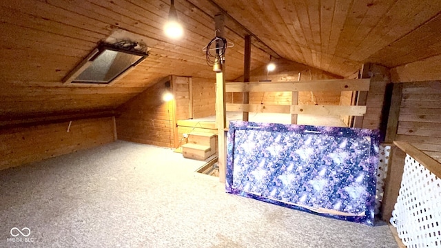 bonus room featuring vaulted ceiling, carpet, wooden walls, and wood ceiling