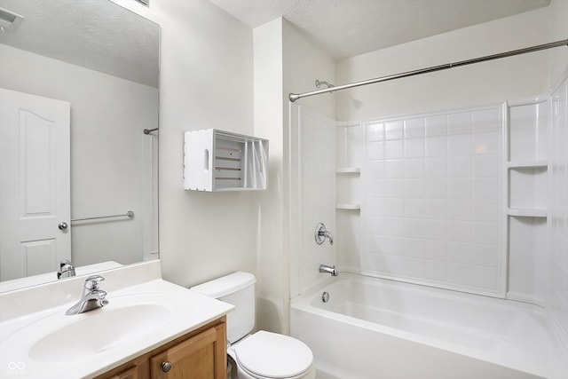 full bathroom featuring toilet, a textured ceiling, vanity, and shower / bathtub combination