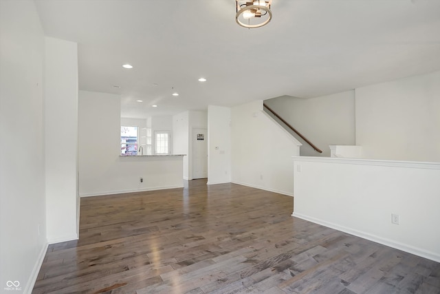 spare room with wood-type flooring