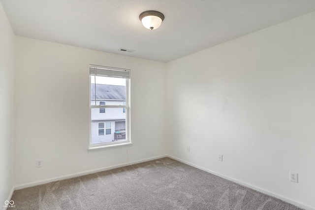 empty room featuring carpet