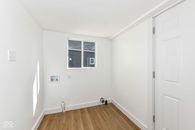 laundry room with hookup for a washing machine and hardwood / wood-style floors