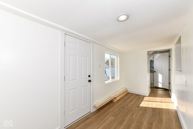 entryway with light hardwood / wood-style floors