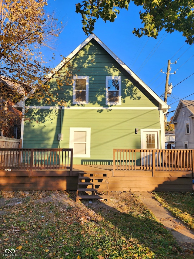 rear view of property with a deck