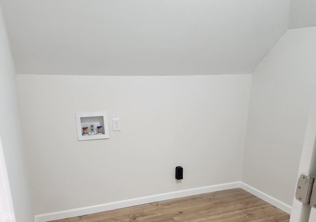 laundry room with washer hookup and light wood-type flooring