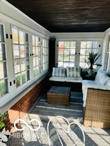 sunroom / solarium with wooden ceiling