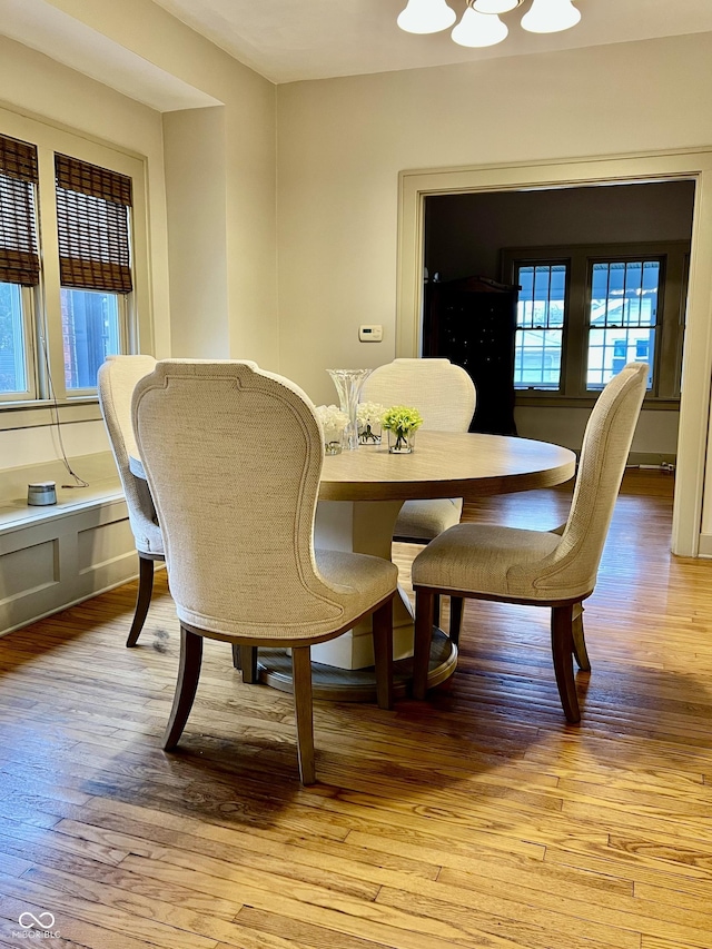 dining area with light wood-type flooring