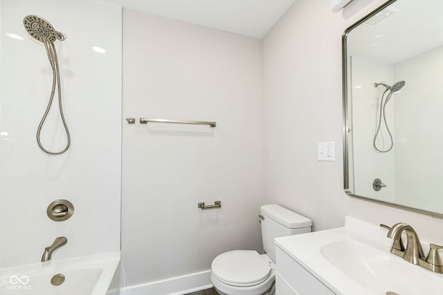 full bathroom featuring  shower combination, vanity, and toilet