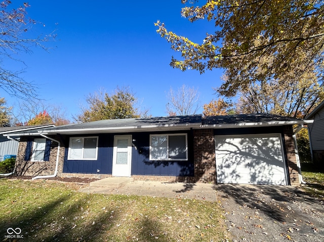 single story home with a garage