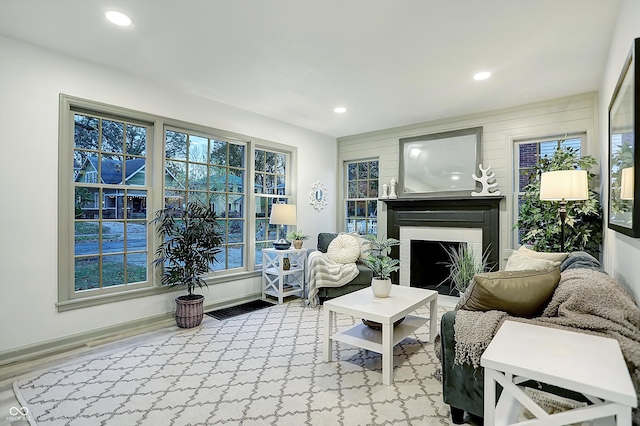 living room featuring light hardwood / wood-style floors and plenty of natural light