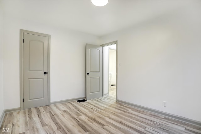 unfurnished bedroom featuring light hardwood / wood-style flooring