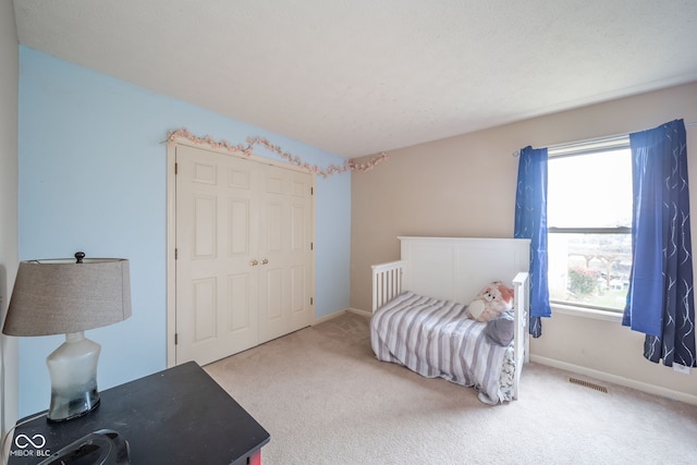 living area featuring carpet flooring