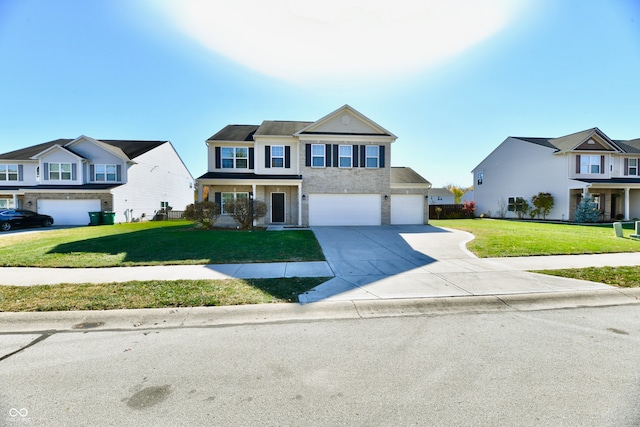 view of front of home featuring a front yard and a garage